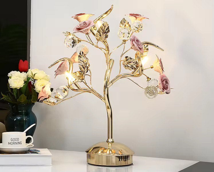 Flower decorates desk lamp